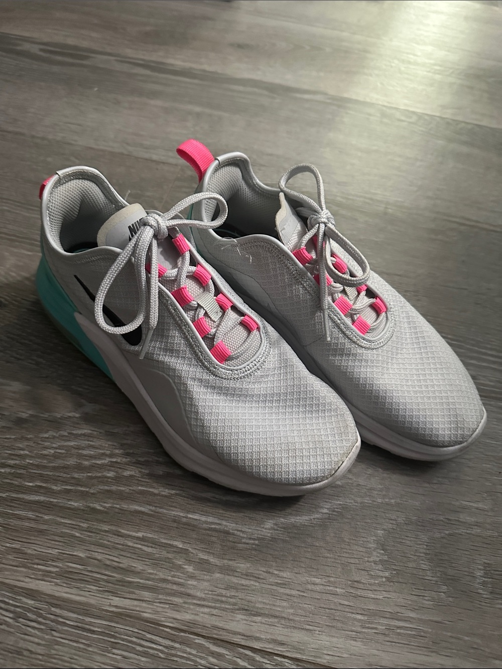 Nike women White Sneakers with Pink Accents and Teal Heel